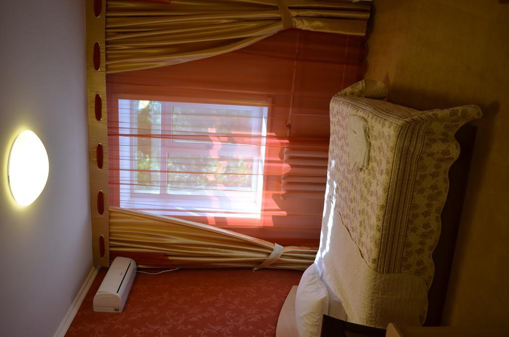 Mereke Hotel Ustʼ-Kamenogorsk Oda fotoğraf
