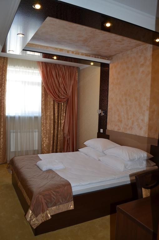 Mereke Hotel Ustʼ-Kamenogorsk Oda fotoğraf